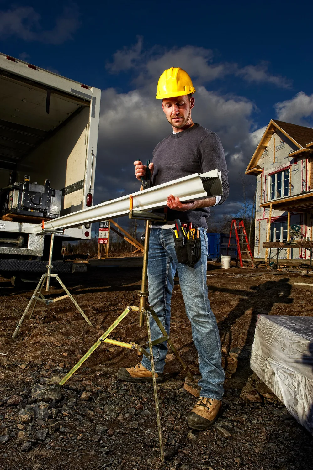 Manufacturer installation image preparing a white gutter section