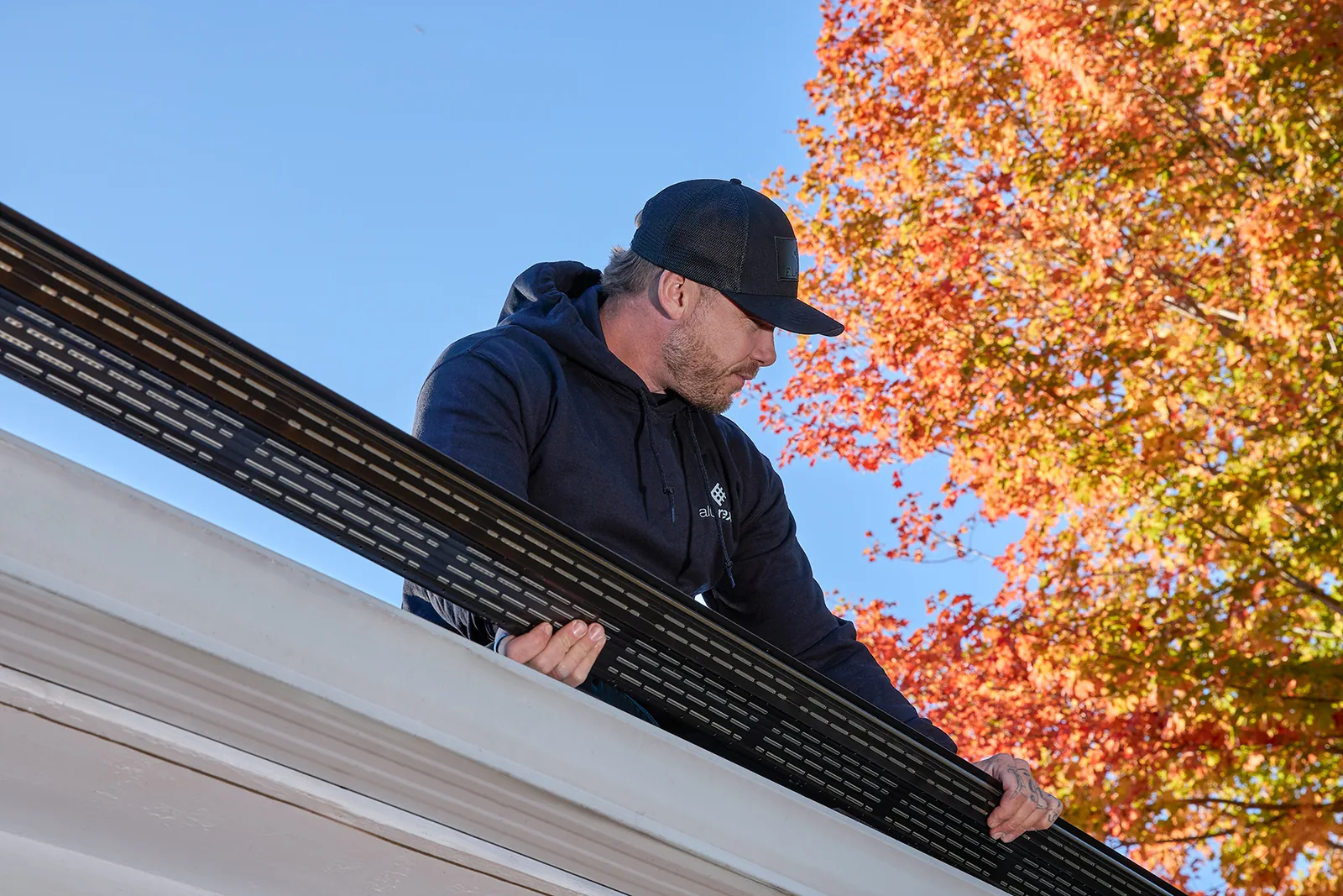 Manufacturer installation photo fitting continuous gutter protection