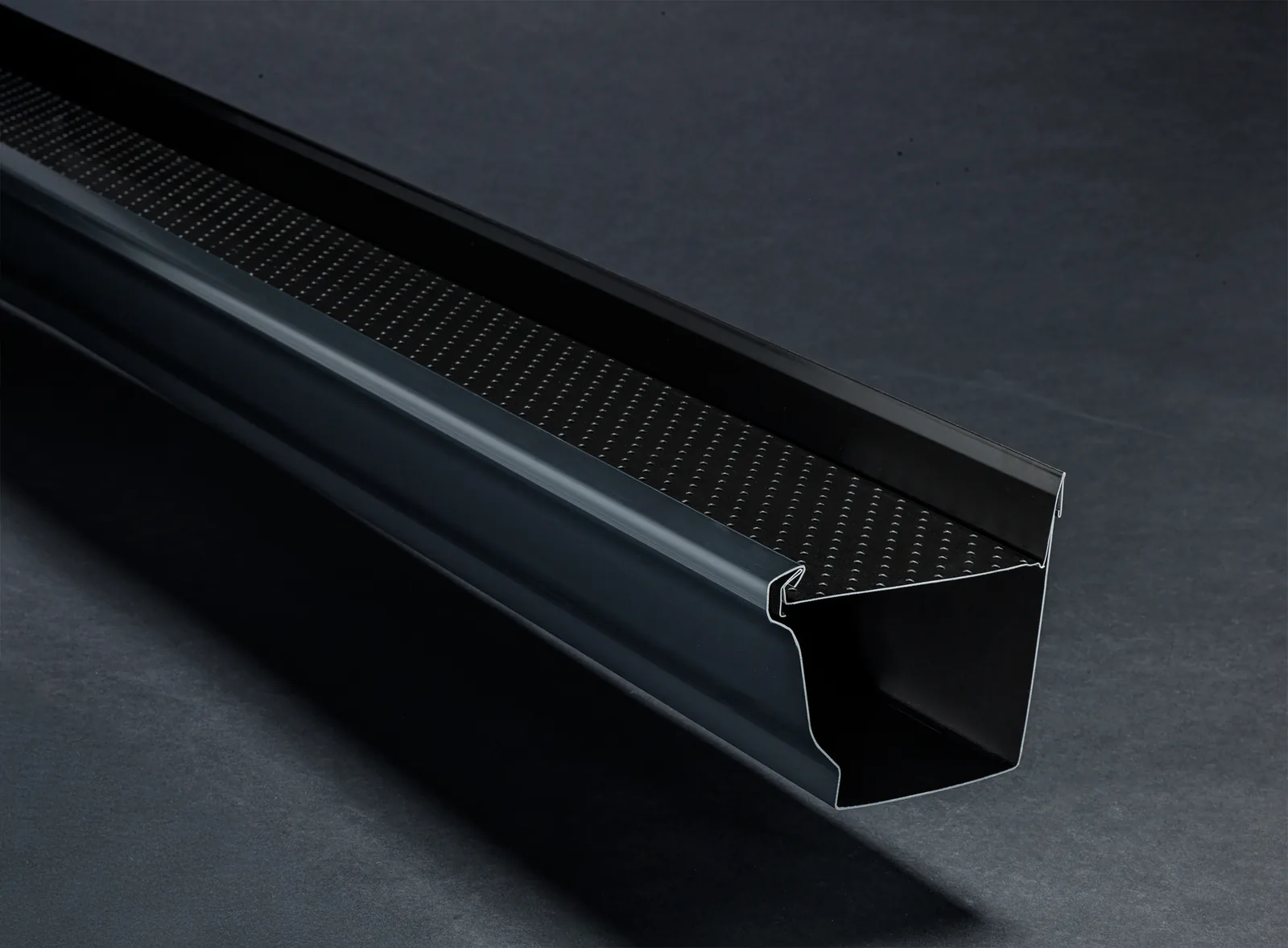 Alu-Rex T-Rex continuous hanger shown with a black K-style gutter