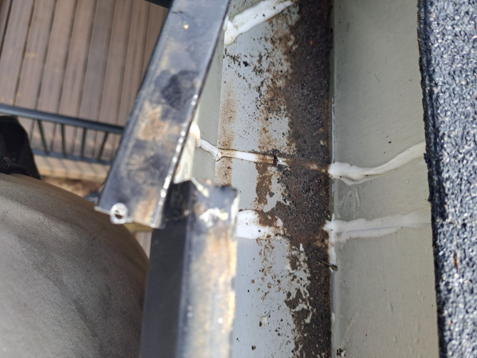 Field example showing a very short overlap at a gutter joint on a system not installed by McCloud Gutter.