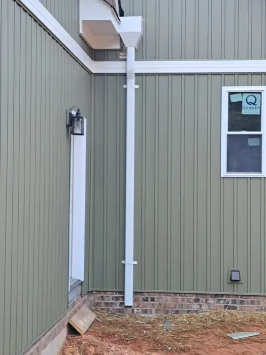Custom gutter solution for a tight water problem area